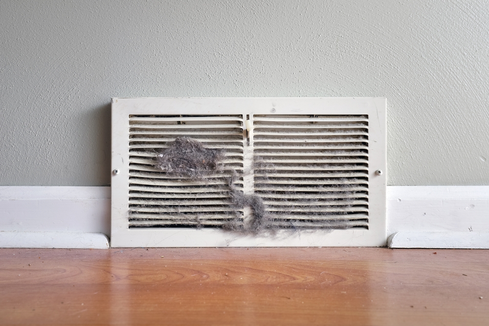 Dirty,Register,Wall,Vent,With,Dust,Clogging,The,Duct,Opening