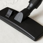 Cleaning,White,Carpet,With,A,Vacuum,Cleaner,And,Black,Universal