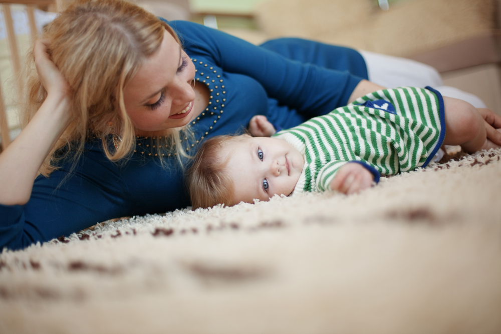 Mother,With,Her,Baby,At,Home